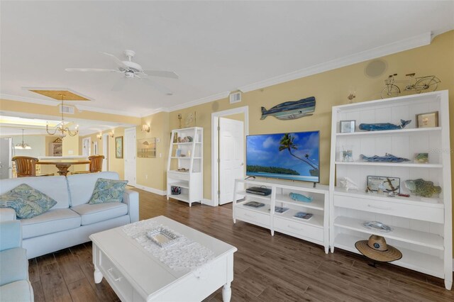 4631 S Atlantic Ave Unit 8102, Port Orange, FL 32127 - living room with ornamental molding, a chandelier, ceiling fan, and wood finished floors