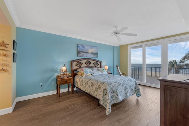 4631 S Atlantic Ave Unit 8102, Port Orange, FL 32127 - bedroom with access to outside, wood finished floors, crown molding, and a ceiling fan