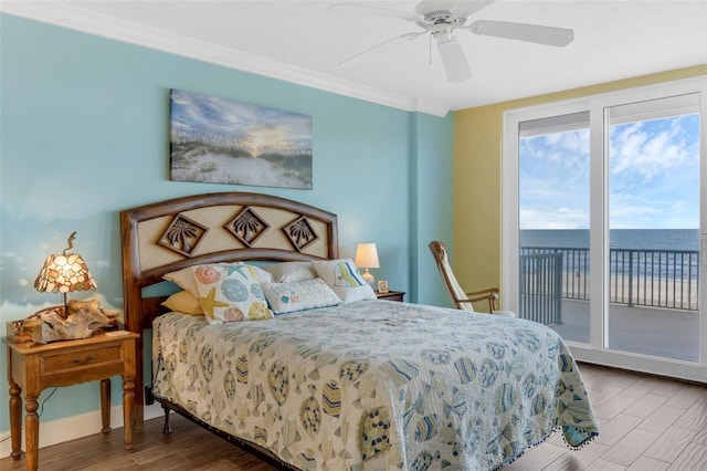 4631 S Atlantic Ave Unit 8102, Port Orange, FL 32127 - bedroom featuring access to exterior, wood finished floors, ornamental molding, and ceiling fan