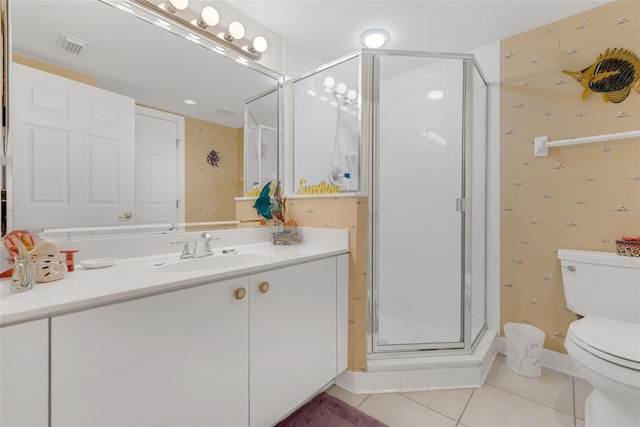 4631 S Atlantic Ave Unit 8102, Port Orange, FL 32127 - bathroom with wallpapered walls, vanity, a stall shower, and tile patterned flooring