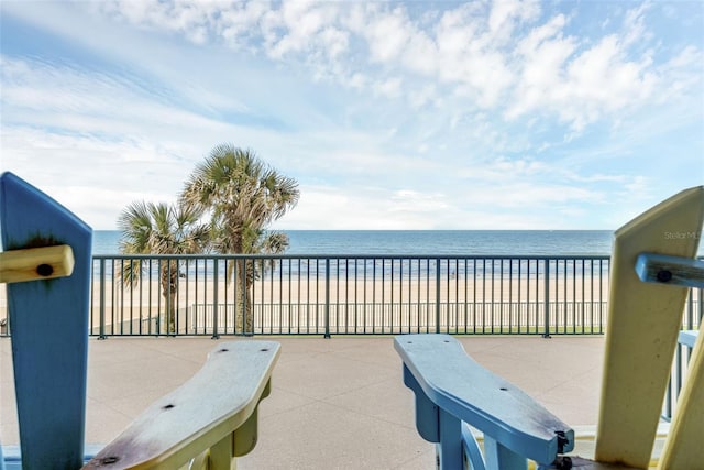 4631 S Atlantic Ave Unit 8102, Port Orange, FL 32127 - view of patio with view of water and beach