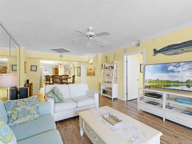 4631 S Atlantic Ave Unit 8102, Port Orange, FL 32127 - living room with wood finished floors, ornamental molding, and ceiling fan