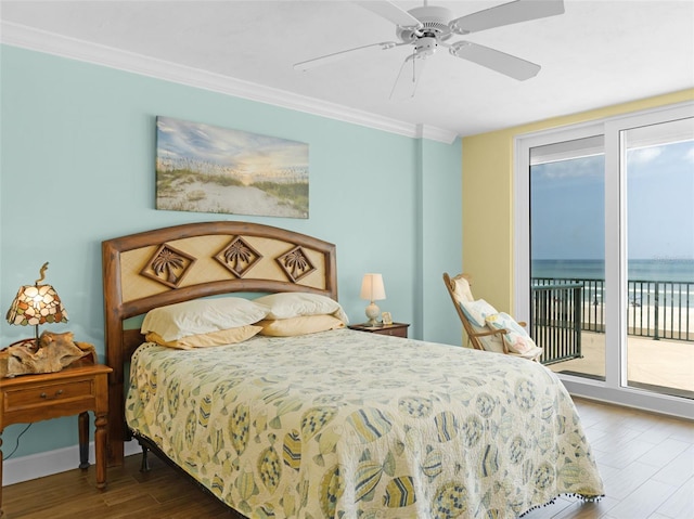 4631 S Atlantic Ave Unit 8102, Port Orange, FL 32127 - bedroom featuring wood finished floors, access to exterior, ornamental molding, and a ceiling fan