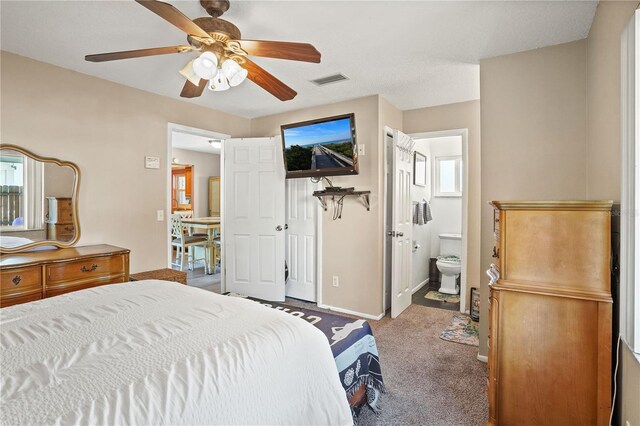 109 Woodfield Ct, Sanford, FL 32773 - bedroom with carpet flooring, multiple windows, ensuite bathroom, and ceiling fan