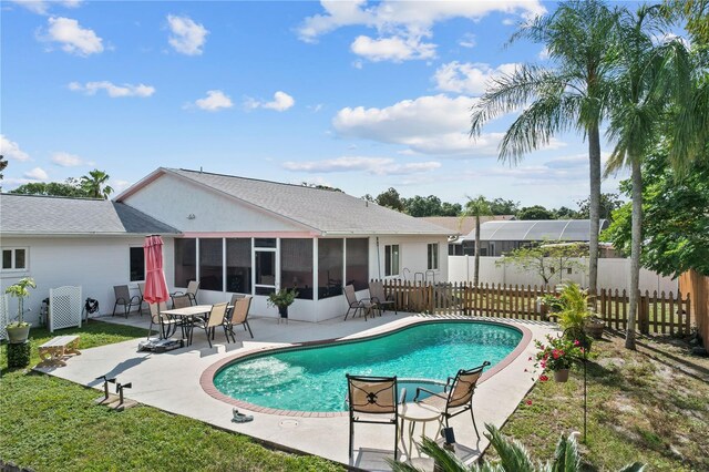 109 Woodfield Ct, Sanford, FL 32773 - view of swimming pool with a sunroom and a patio