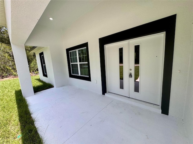 142 W Diego Pl, Citrus Springs, FL 34434 - view of patio / terrace with french doors