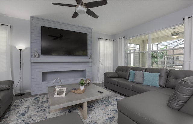 1811 Caribbean View Ter, Kissimmee, FL 34747 - living room featuring baseboards and ceiling fan