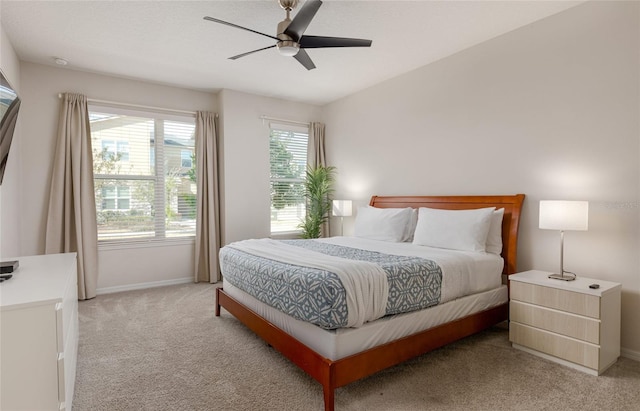 1811 Caribbean View Ter, Kissimmee, FL 34747 - bedroom featuring light colored carpet and ceiling fan