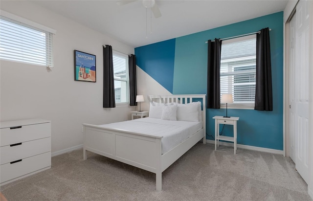 1811 Caribbean View Ter, Kissimmee, FL 34747 - bedroom with a closet, carpet, and a ceiling fan