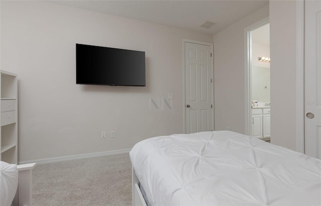 1811 Caribbean View Ter, Kissimmee, FL 34747 - bedroom with carpet and connected bathroom
