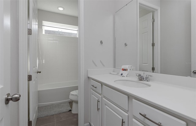 1811 Caribbean View Ter, Kissimmee, FL 34747 - bathroom featuring vanity, tile patterned flooring, and shower / washtub combination