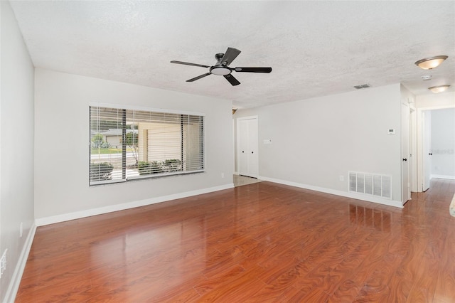 917 Great Bend Rd, Altamonte Springs, FL 32714 - spare room featuring ceiling fan, a textured ceiling, and wood finished floors