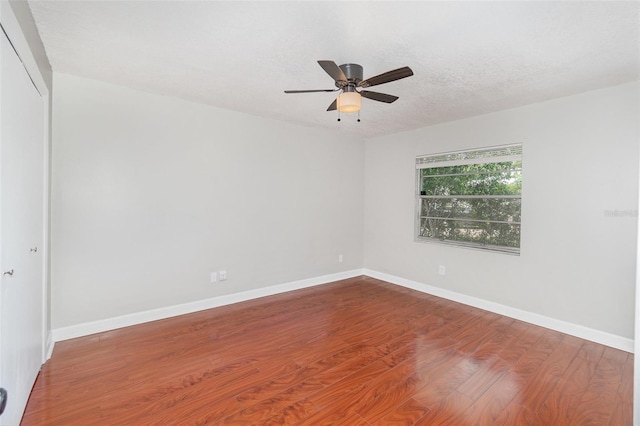 917 Great Bend Rd, Altamonte Springs, FL 32714 - unfurnished room featuring wood finished floors, ceiling fan, and a textured ceiling