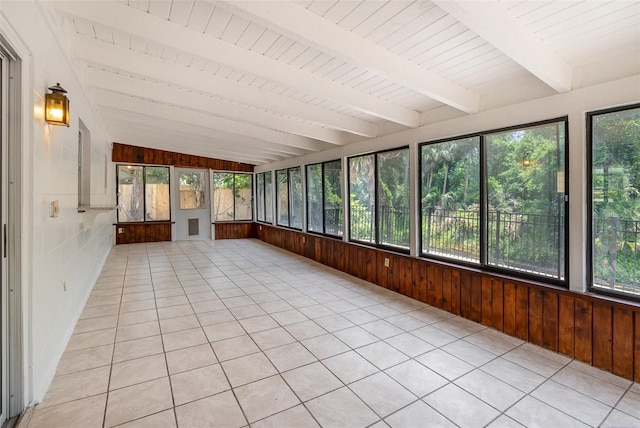 917 Great Bend Rd, Altamonte Springs, FL 32714 - unfurnished sunroom with wooden walls, plenty of natural light, and tile patterned floors