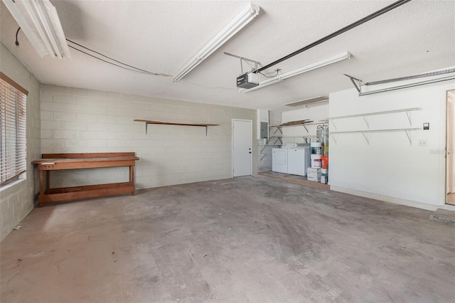 917 Great Bend Rd, Altamonte Springs, FL 32714 - garage featuring separate washer and dryer, concrete block wall, and a garage door opener
