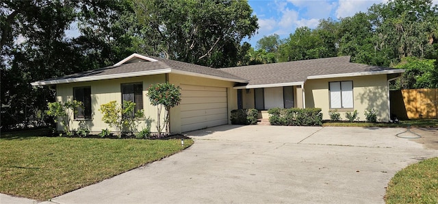 917 Great Bend Rd, Altamonte Springs, FL 32714 - ranch-style home featuring an attached garage, concrete driveway, a shingled roof, and stucco siding