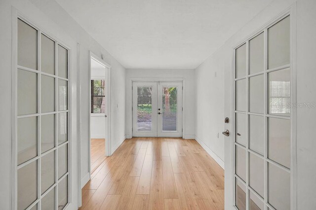 5460 SE 28th St, Ocala, FL 34480 - entrance foyer with french doors and light wood finished floors