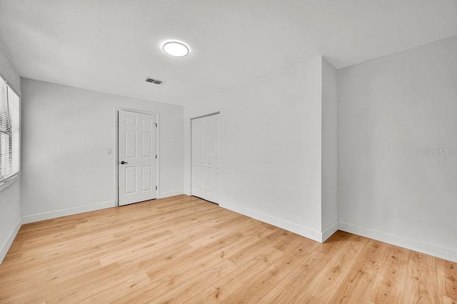 5460 SE 28th St, Ocala, FL 34480 - empty room with baseboards and light wood-style flooring
