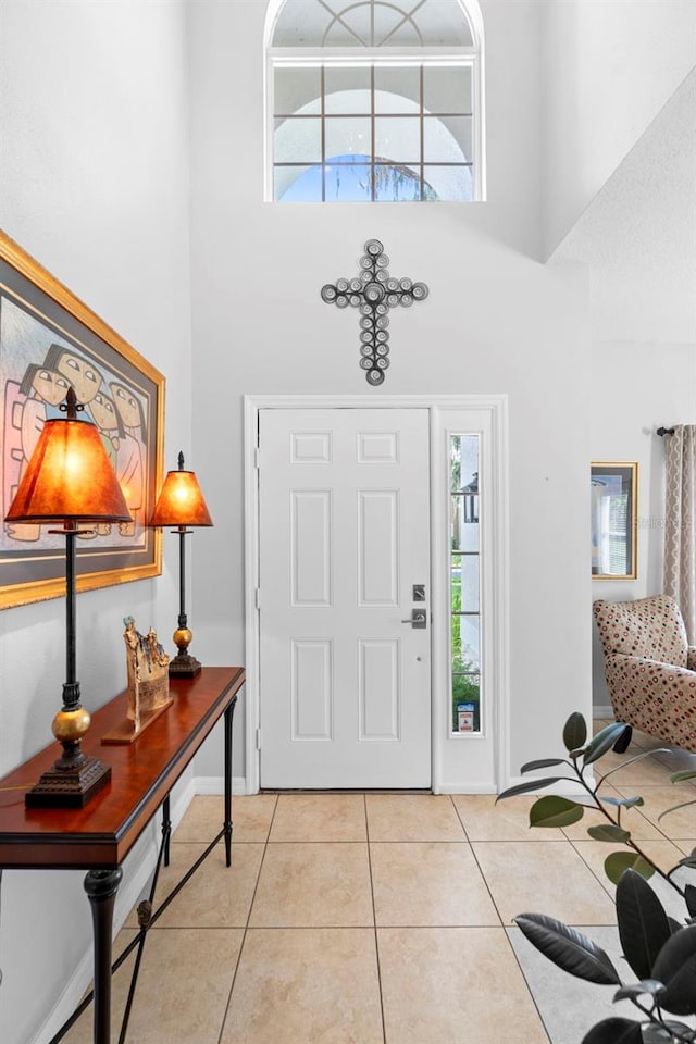 1785 Rushden Dr, Ocoee, FL 34761 - foyer with a high ceiling, light tile patterned floors, and healthy amount of natural light