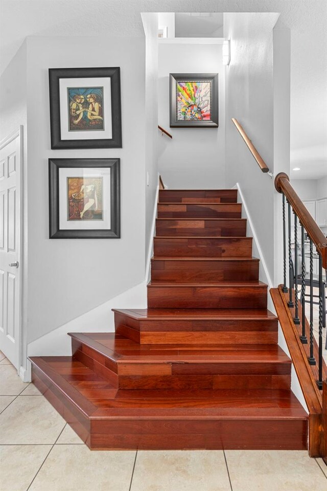 1785 Rushden Dr, Ocoee, FL 34761 - stairway featuring tile patterned flooring and baseboards