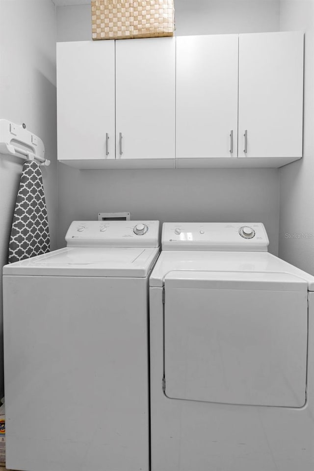 1785 Rushden Dr, Ocoee, FL 34761 - laundry area with separate washer and dryer and cabinet space