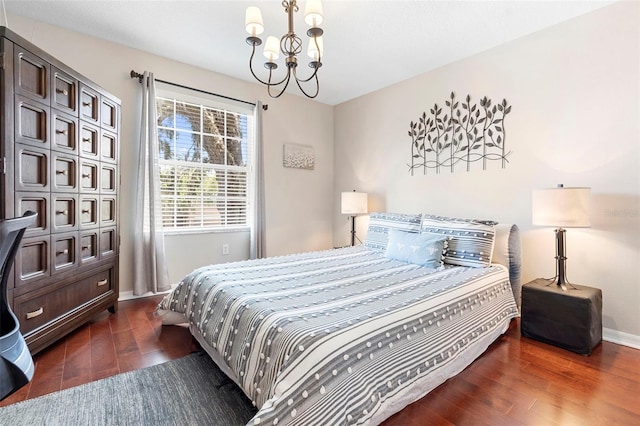 1785 Rushden Dr, Ocoee, FL 34761 - bedroom featuring a chandelier and dark wood finished floors