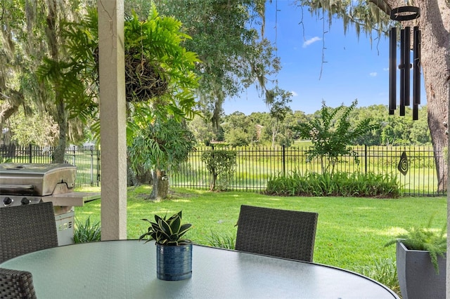 1785 Rushden Dr, Ocoee, FL 34761 - fenced backyard with outdoor dining area and grilling area