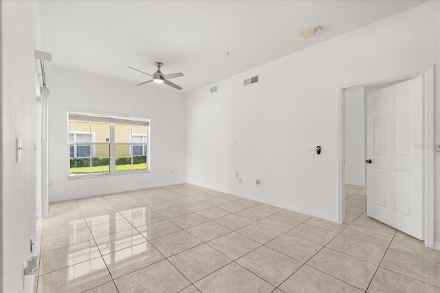 2280 San Vital Dr Unit 101, Kissimmee, FL 34741 - spare room featuring light tile patterned flooring and a ceiling fan