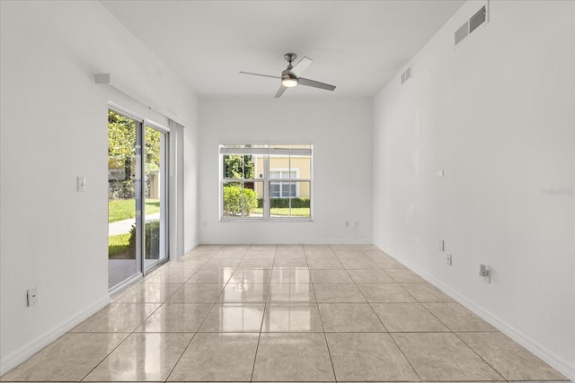 2280 San Vital Dr Unit 101, Kissimmee, FL 34741 - spare room featuring ceiling fan and light tile patterned floors