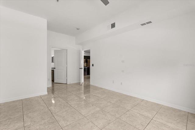 2280 San Vital Dr Unit 101, Kissimmee, FL 34741 - empty room with light tile patterned flooring