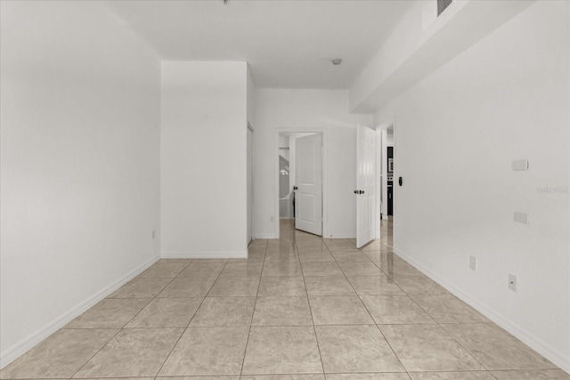 2280 San Vital Dr Unit 101, Kissimmee, FL 34741 - unfurnished room with light tile patterned flooring and baseboards