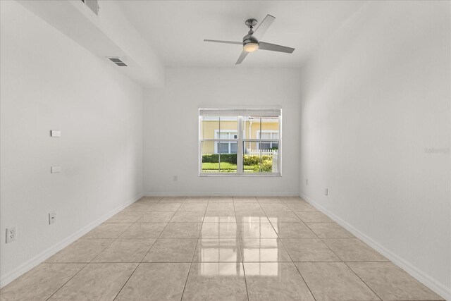 2280 San Vital Dr Unit 101, Kissimmee, FL 34741 - unfurnished room featuring ceiling fan and tile patterned flooring