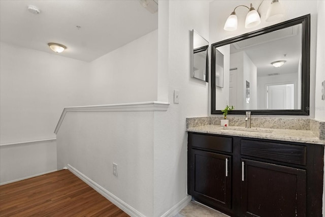 2280 San Vital Dr Unit 101, Kissimmee, FL 34741 - bathroom with vanity and wood finished floors