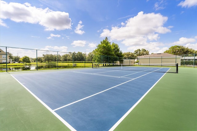 2280 San Vital Dr Unit 101, Kissimmee, FL 34741 - view of tennis court with community basketball court and a water view