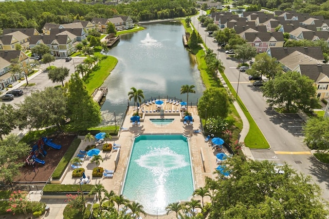2280 San Vital Dr Unit 101, Kissimmee, FL 34741 - aerial view of residential area with a pool area and a nearby body of water