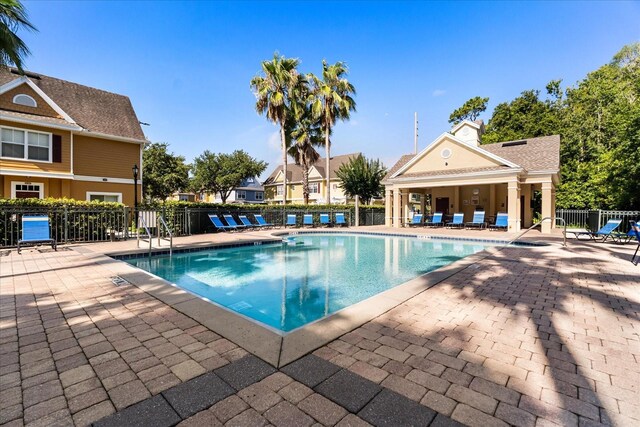 2280 San Vital Dr Unit 101, Kissimmee, FL 34741 - community pool featuring a patio area