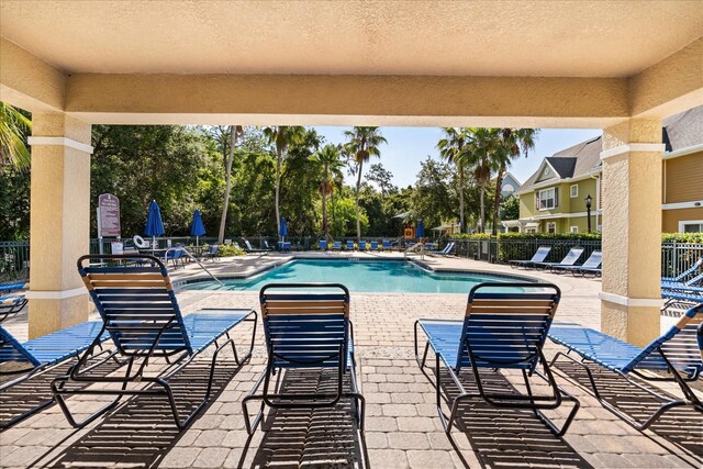 2280 San Vital Dr Unit 101, Kissimmee, FL 34741 - community pool with a patio area