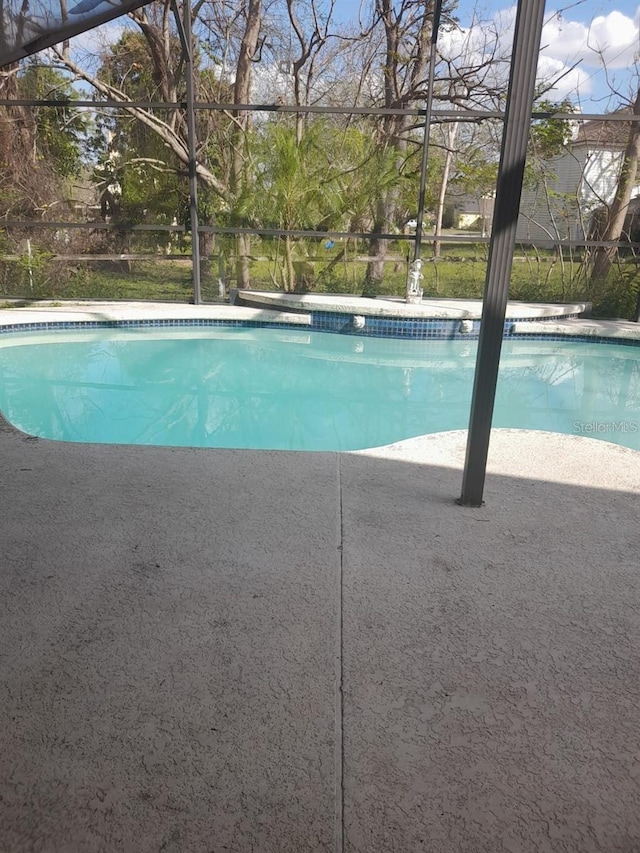 3013 Barrymore Ct, Orlando, FL 32835 - swimming pool with a patio