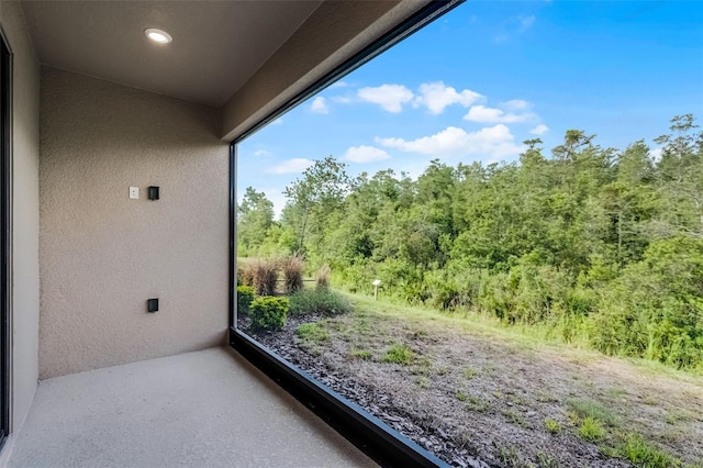 1388 Lombardi Ct, Kissimmee, FL 34759 - balcony featuring a wooded view