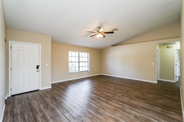 3460 Tomahawk Ave, Spring Hill, FL 34606 - unfurnished living room featuring ceiling fan, vaulted ceiling, and dark wood-type flooring