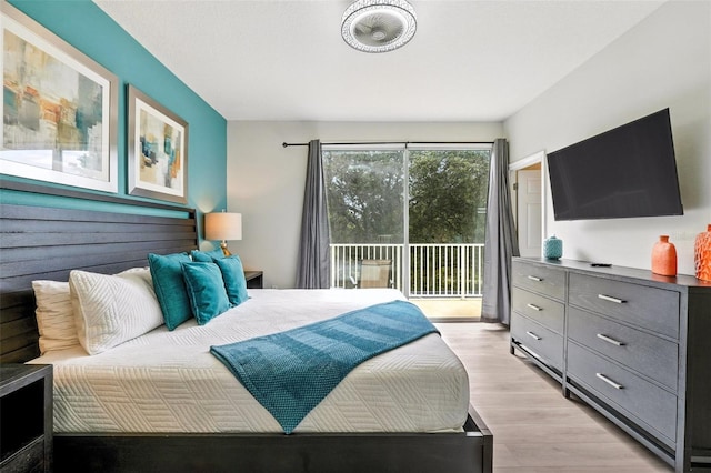 1530 Retreat Cir, Clermont, FL 34714 - bedroom featuring access to exterior and light wood-style floors