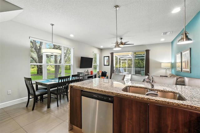 1530 Retreat Cir, Clermont, FL 34714 - kitchen with dishwasher, open floor plan, pendant lighting, a ceiling fan, and recessed lighting