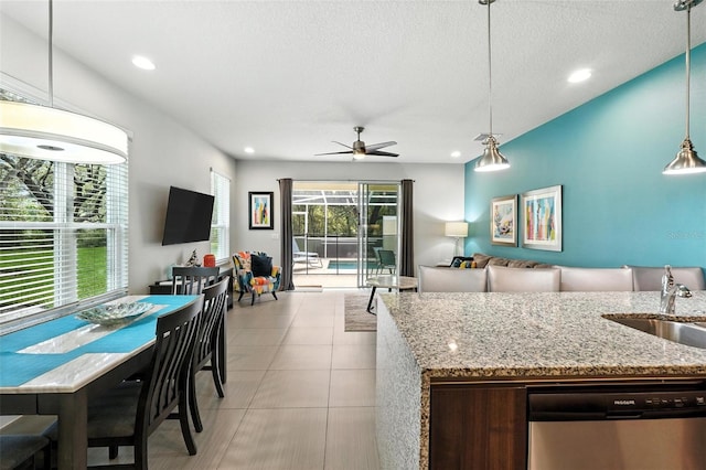 1530 Retreat Cir, Clermont, FL 34714 - kitchen featuring dishwasher, ceiling fan, recessed lighting, open floor plan, and decorative light fixtures