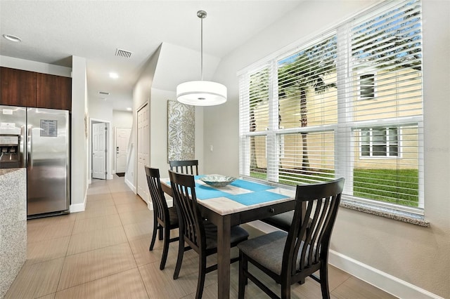 1530 Retreat Cir, Clermont, FL 34714 - dining area featuring baseboards