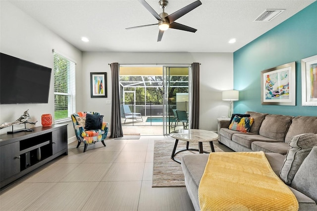 1530 Retreat Cir, Clermont, FL 34714 - living area featuring a ceiling fan, a sunroom, and recessed lighting
