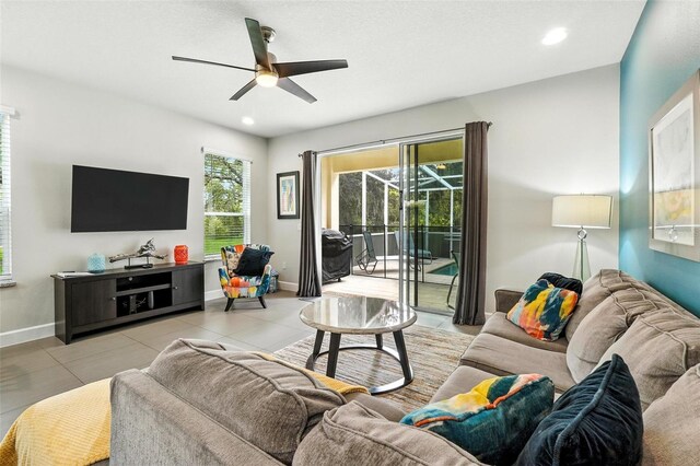 1530 Retreat Cir, Clermont, FL 34714 - tiled living area featuring ceiling fan and a sunroom