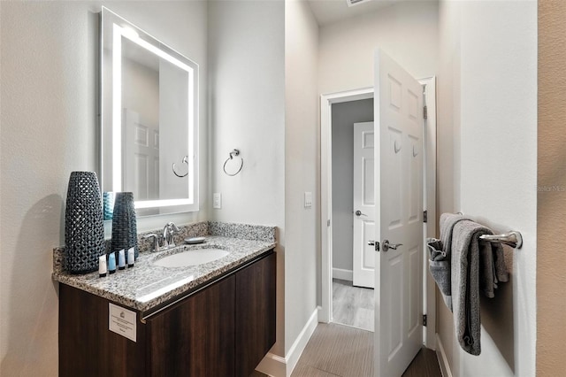 1530 Retreat Cir, Clermont, FL 34714 - bathroom with vanity and wood finished floors