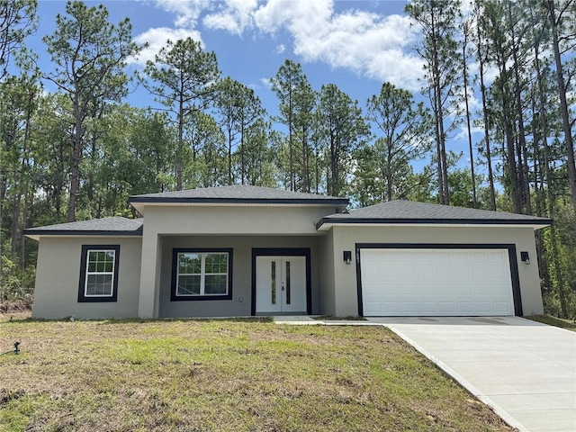 7687 N Quibble Ave, Dunnellon, FL 34434 - view of front of house with stucco siding, an attached garage, driveway, and a front yard