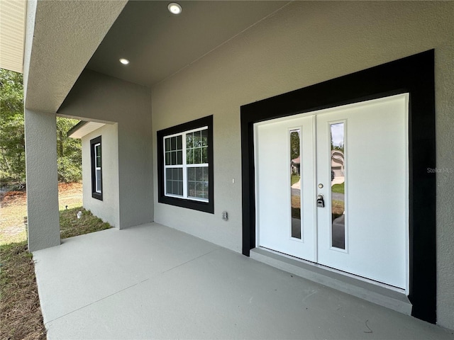 7687 N Quibble Ave, Dunnellon, FL 34434 - view of patio / terrace featuring french doors