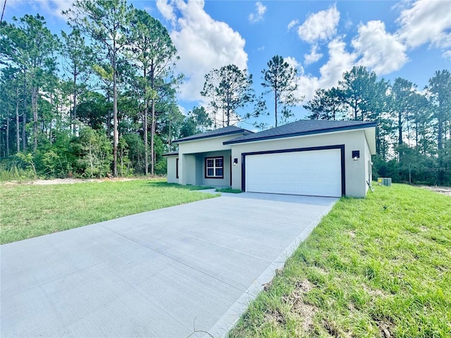 8051 N Pinkinz Way, Citrus Springs, FL 34433 - ranch-style house featuring driveway, a garage, stucco siding, and a front yard